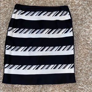White House Black Market black, grey, white. Fully lined, side zip, tiered skirt